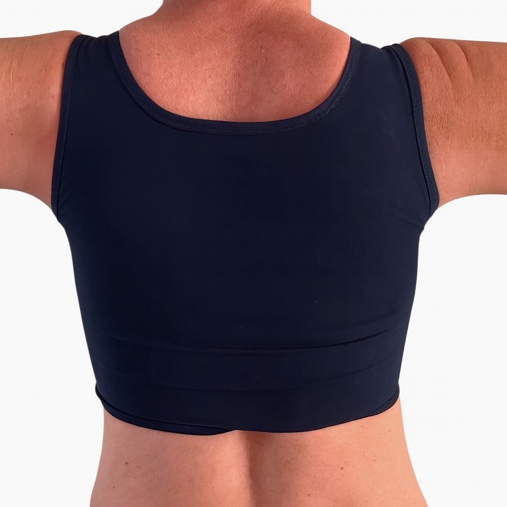 Chest compression (compression thoracique), breast binding (bandage des seins), chest binding (bandage thoracique), chest bandaging (bandage de la poitrine), breast reduction (réduction mammaire), chest binding (bandage thoracique), breast binding (bandage des seins), chest compression (compression thoracique), breast flattening (aplatissement de la poitrine), chest bandaging (bandage de la poitrine), chest binder (binder thoracique), trans binder (binder transgenre), FTM binder (binder FTM), compression top (top de compression), chest binder (binder thoracique), chest compressor (compresseur thoracique), binder (binder), trans binder bra (soutien-gorge binder transgenre), chest binder FTM (binder thoracique FTM), compression top transgender binder (top de compression pour personnes transgenres). Secure binding (bandage sécurisé), responsible binding (bandage responsable), proper binding (bandage approprié), health-conscious binding (bandage respectueux de la santé), safe chest binding (compression thoracique sûre), risk-aware binding (bandage conscient des risques), non-harmful binding (bandage non nuisible), protective binding (bandage protecteur).